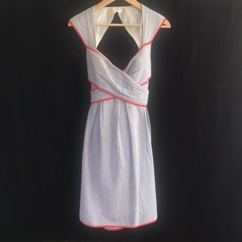 Blue and white striped dress with red trim